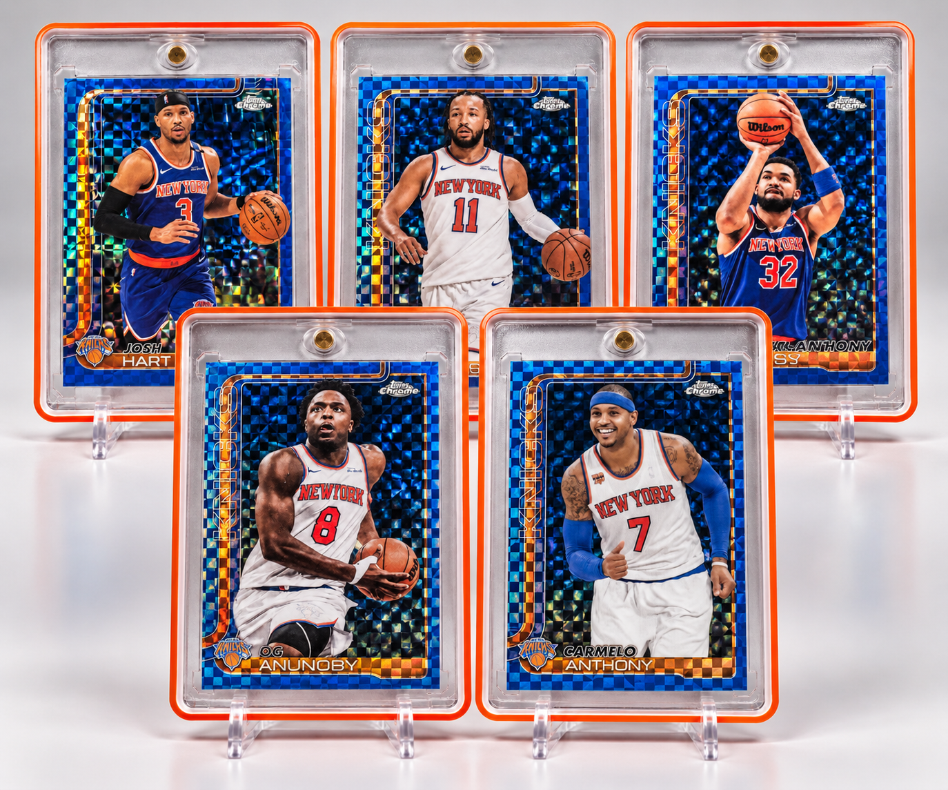 Five Knicks Blue X-Fractor chase cards displayed in orange one-touch cases